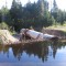 A beaver dam blocked this culvert, which caused the road to fail. The culvert will be replaced with a permanent bridge.